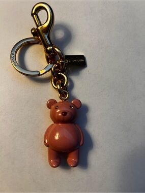 Coach bear charm